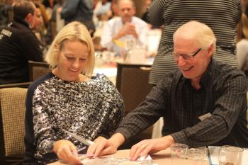 Al Power and Veronique Boscart from the Schlegel-UW RIA take part in a team-buidling exercise at this year's Operational Planning Retreat.