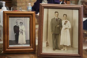 Lloyd and Ruth alongside Mervin and Lois on their  respective wedding days. 